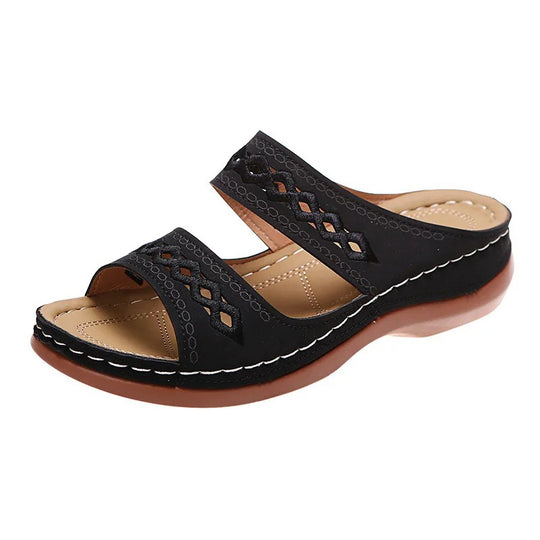 Claquette orthopédique femme à design ajouré noir