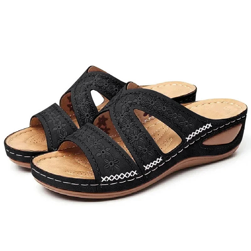 Claquette orthopédique femme à talon compensé noir